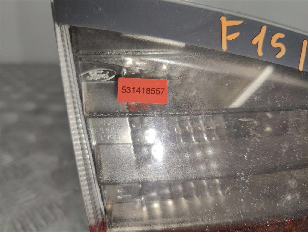 Фонарь крышки багажника левый