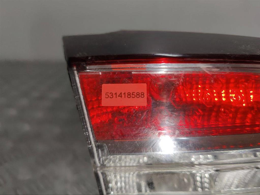 Фонарь крышки багажника левый