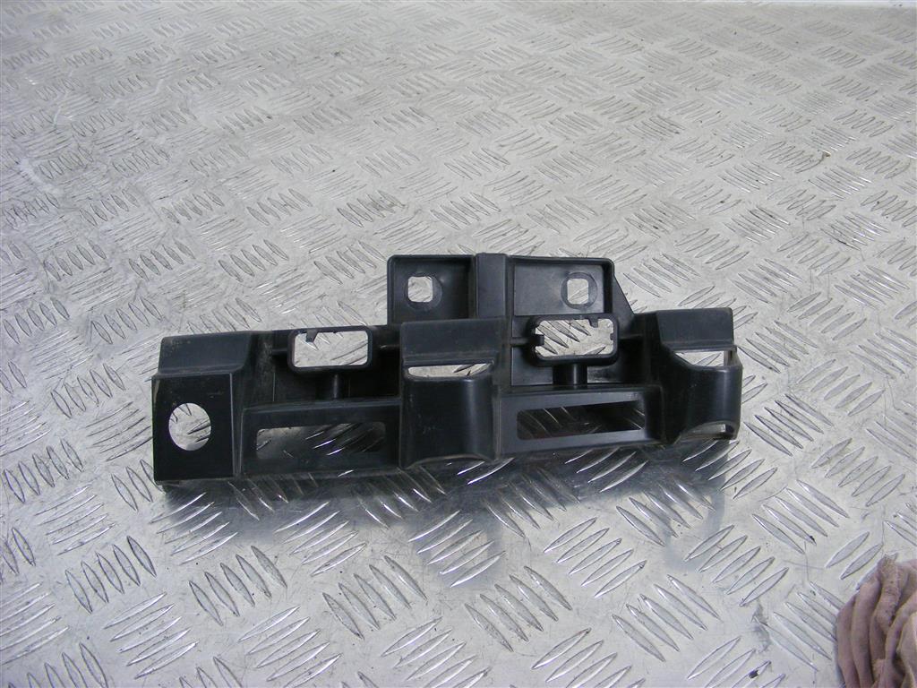 Крепление фары левой