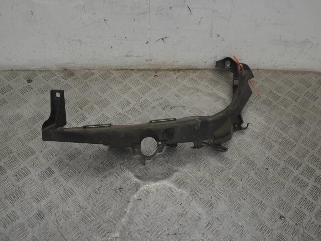 Крепление фары левой