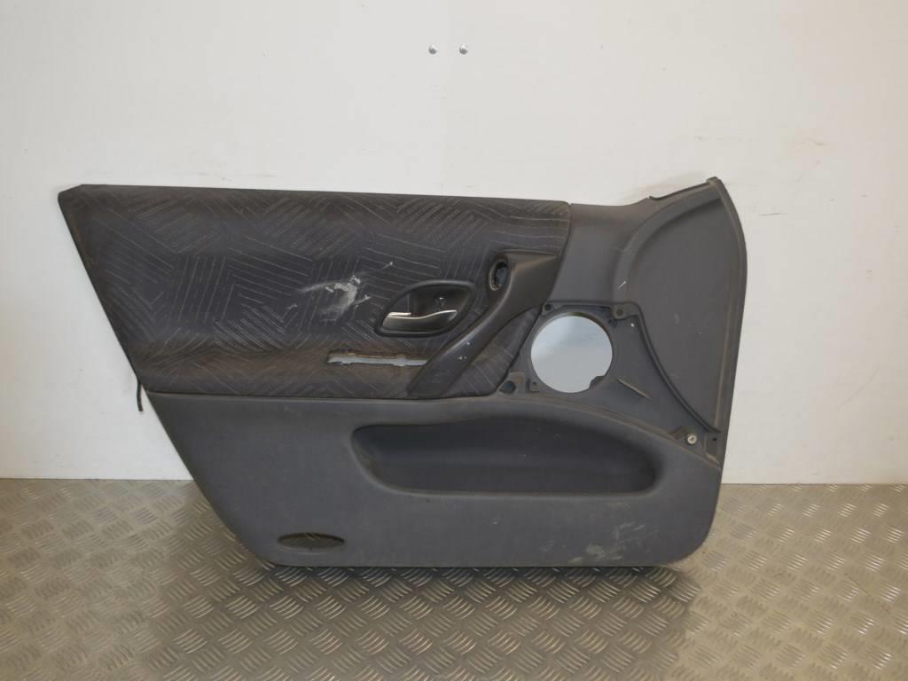 Обшивка двери передней левой (дверная карта)