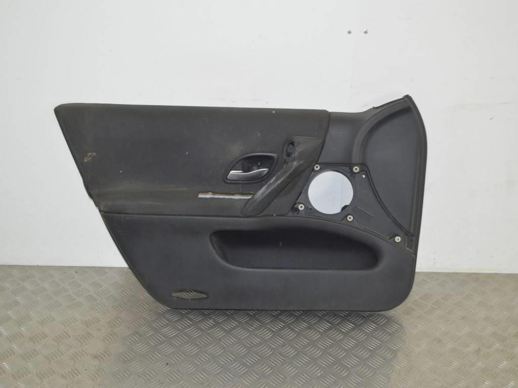 Обшивка двери передней левой (дверная карта)