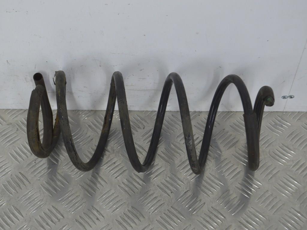 Пружина задняя