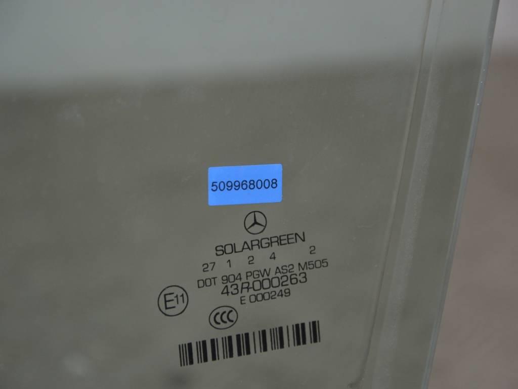 Стекло двери передней левой