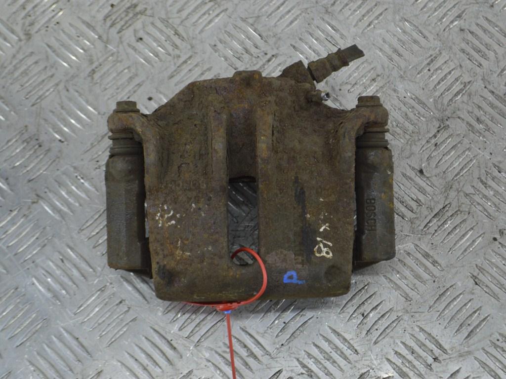 Суппорт передний левый