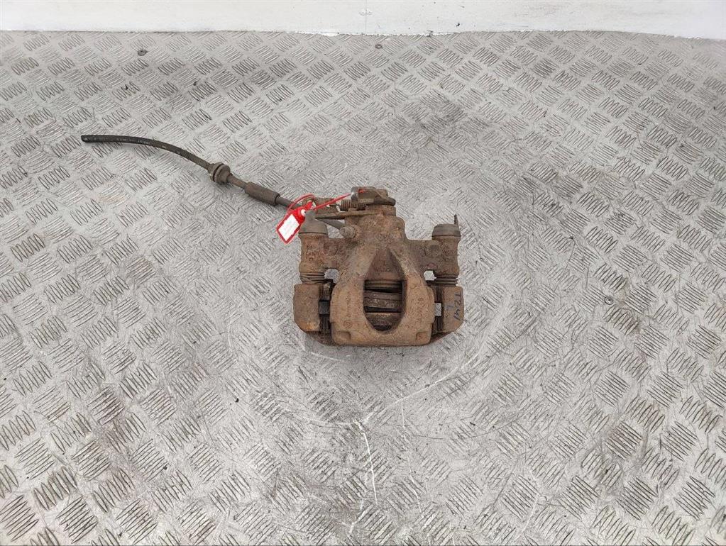 Суппорт задний левый