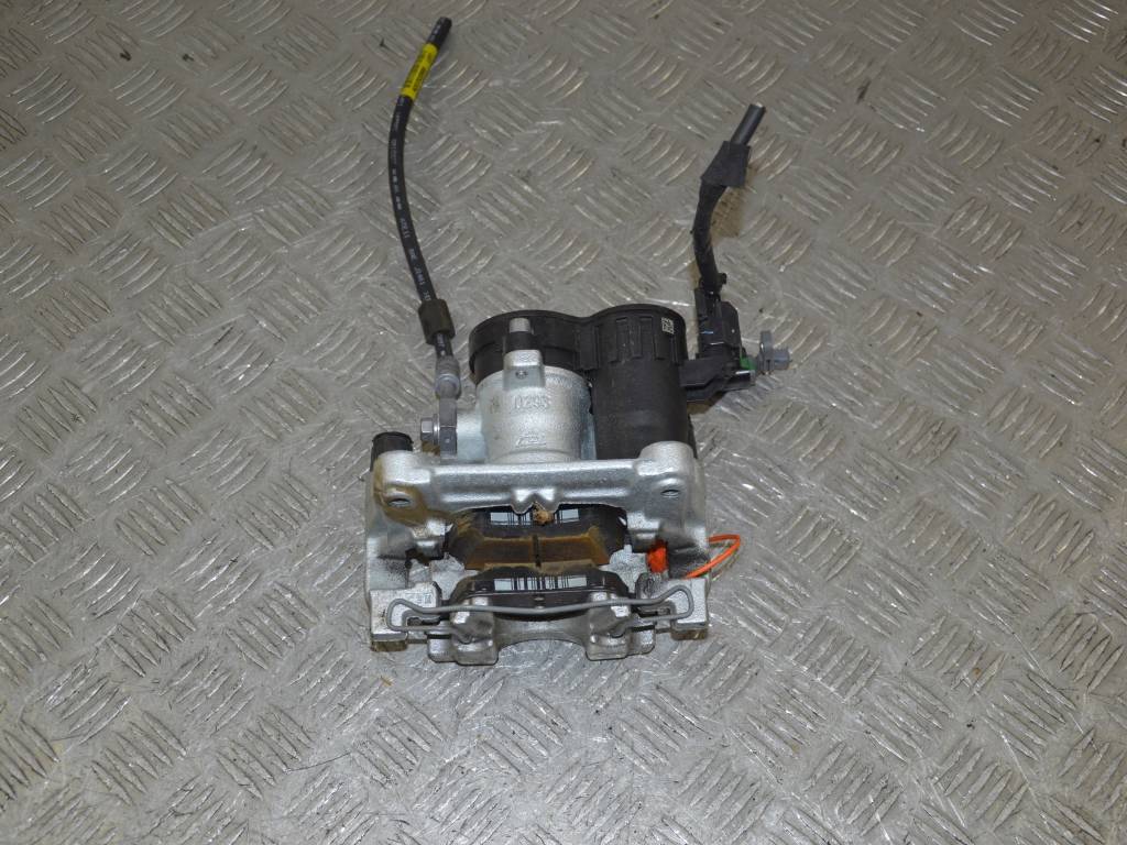 Суппорт задний левый