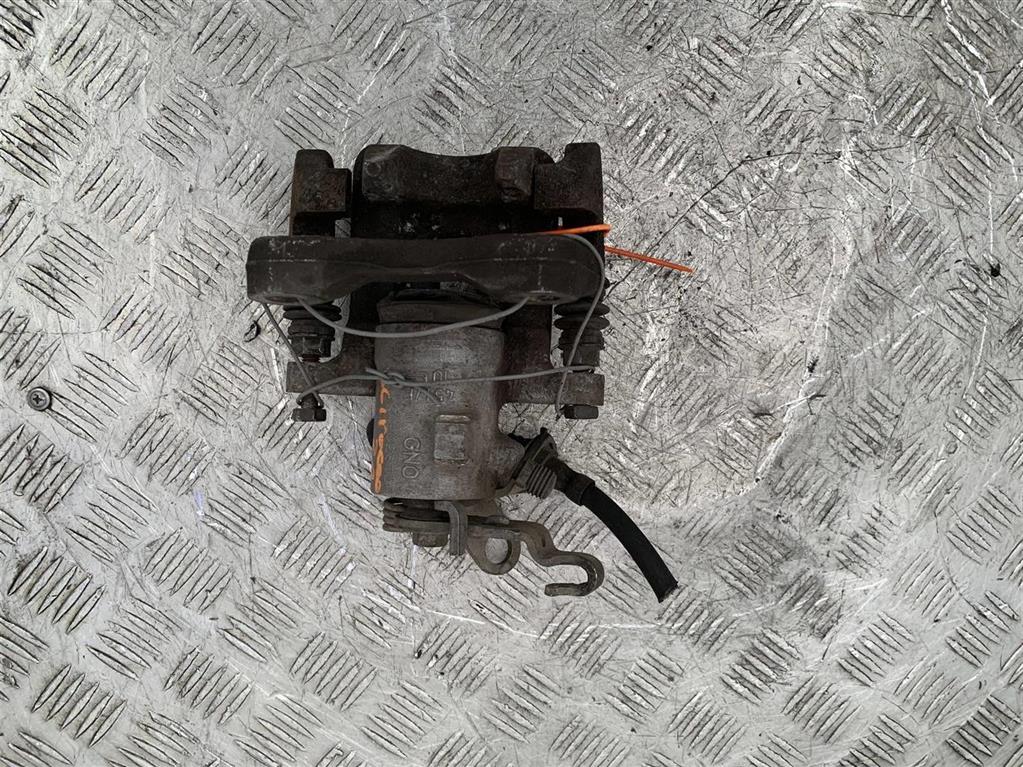 Суппорт задний левый