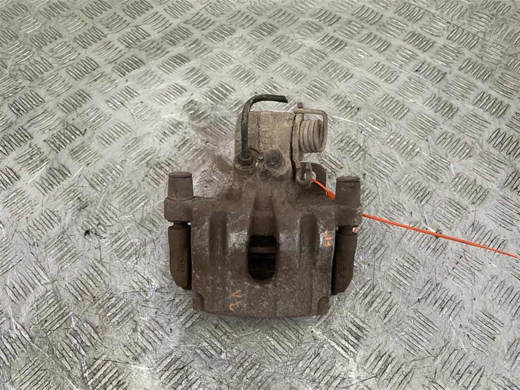 Суппорт задний левый